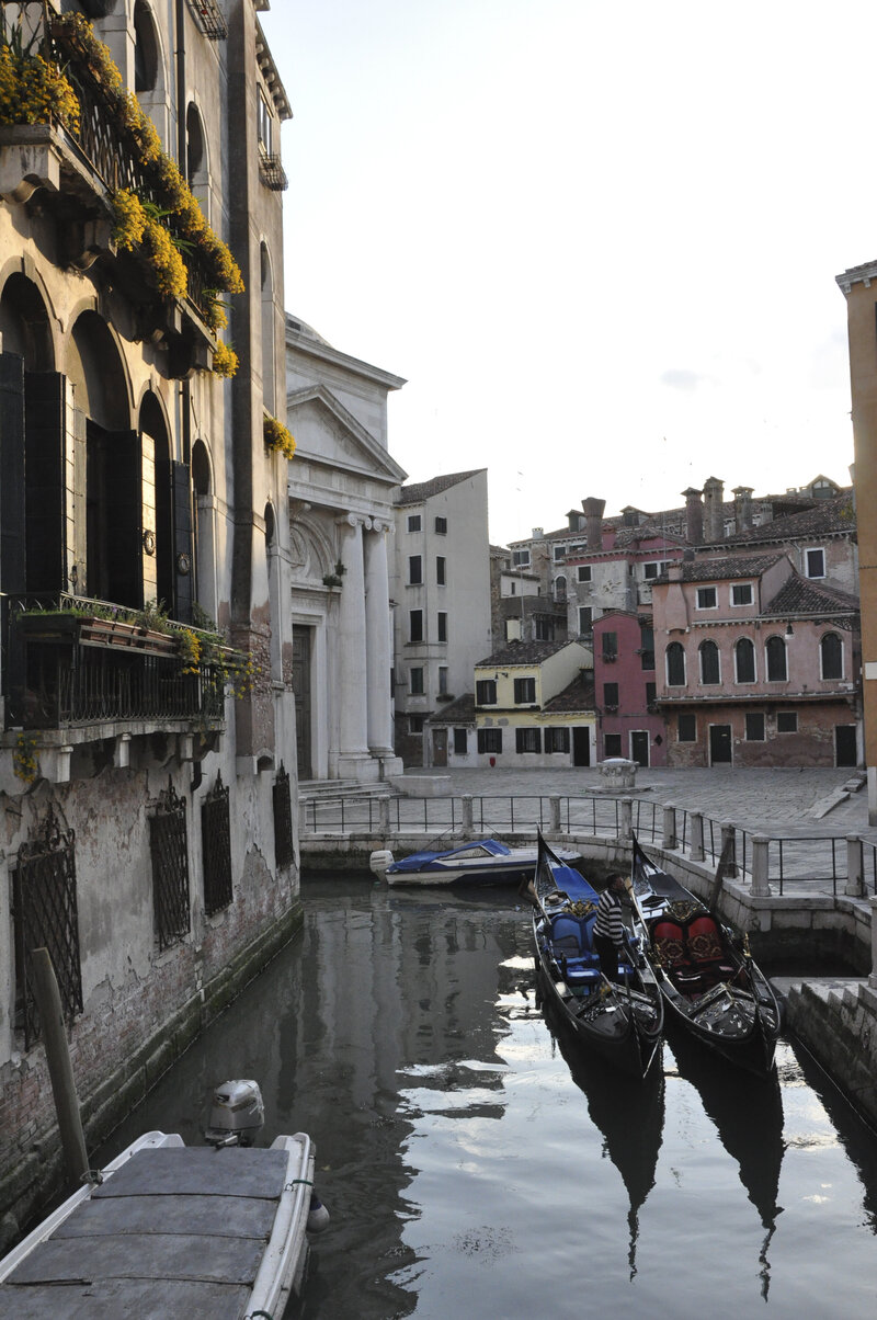 gondolas in a waterway in Italy