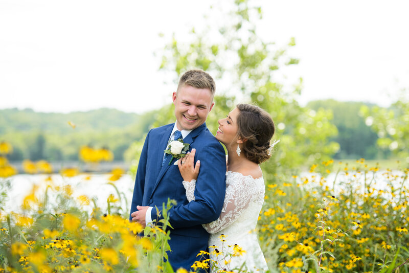 Bride and Groom in gorgeous sunflower field