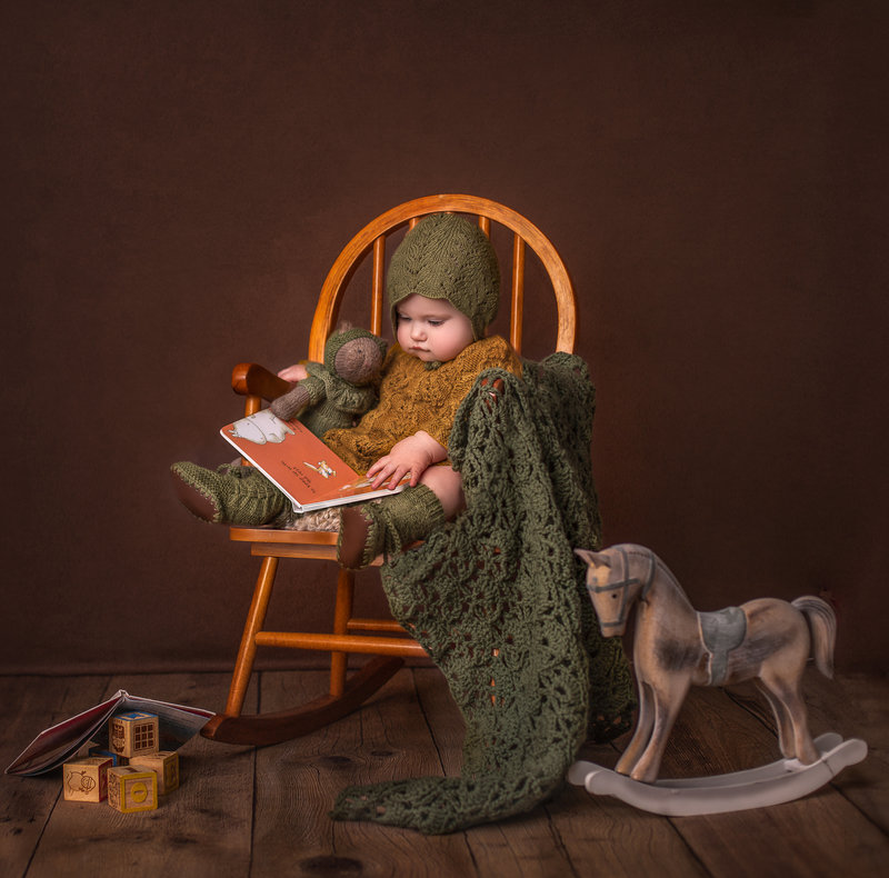 "6-month-old baby captured in a timeless milestone photography session, showcasing their development and personality during this exciting stage in Ottawa."