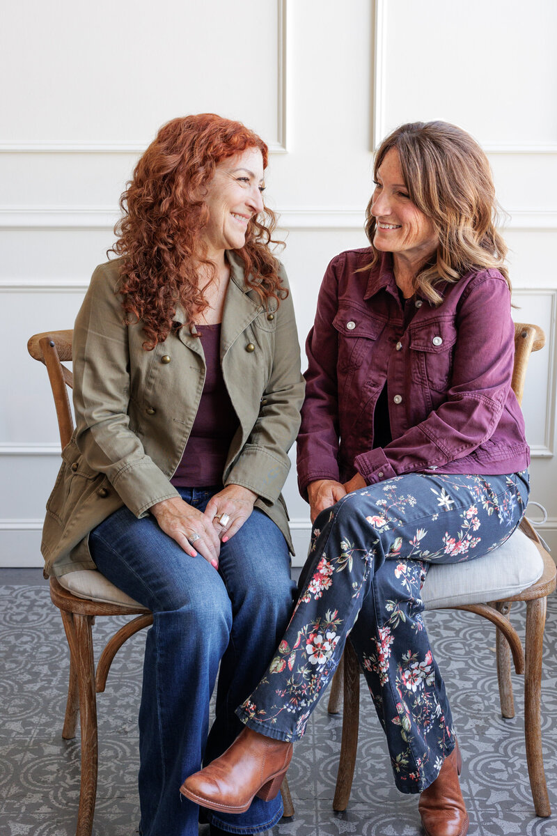 Two sisters sitting together  lifestyle team branding session