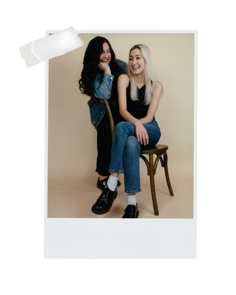 Best friends and events & planning business owners smiling in a studio photoshoot. 