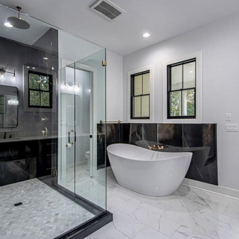 Bathroom with a custom shower and tile work.