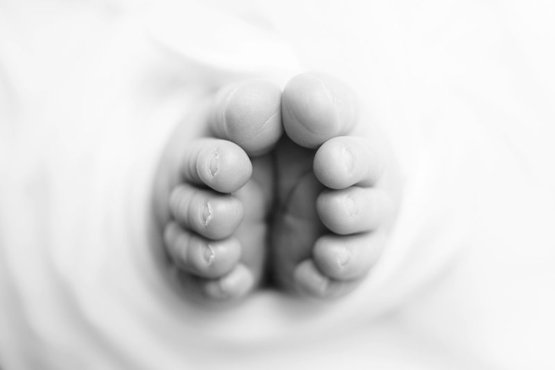 black and white baby feet