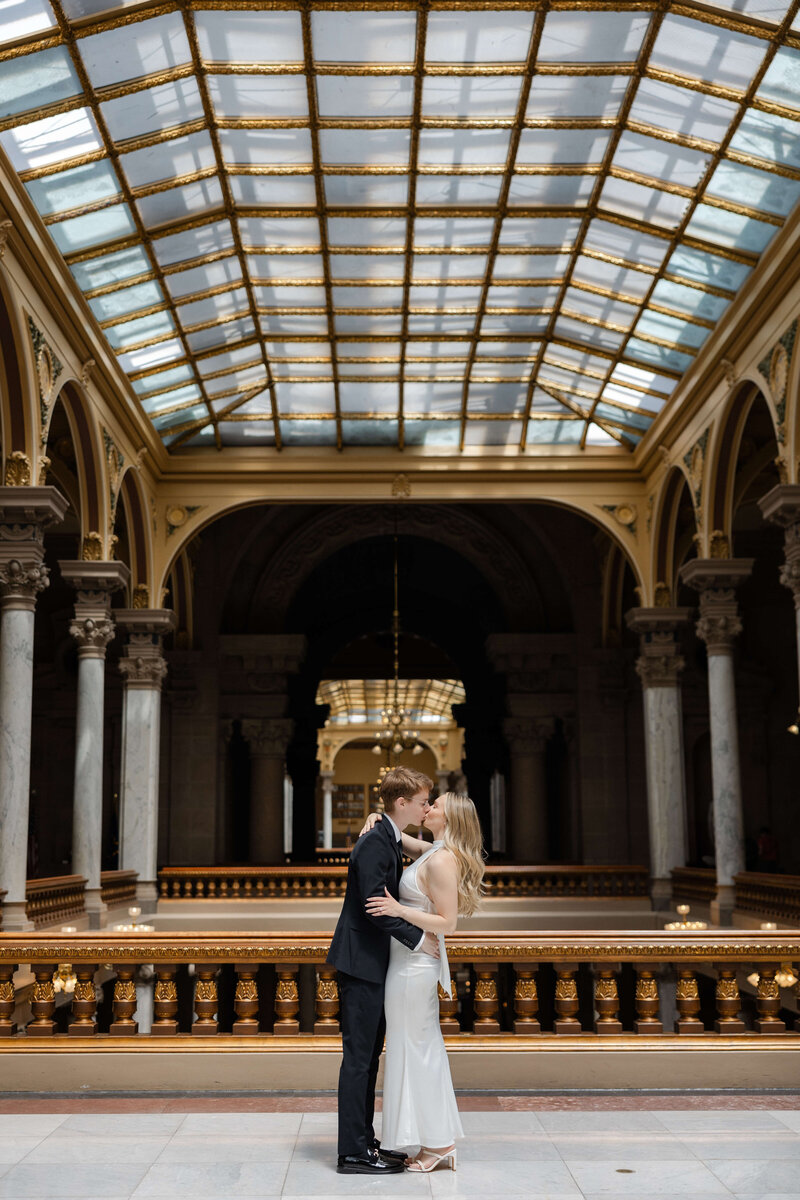 Bride and groom walk up memorial steps at their DC wedding