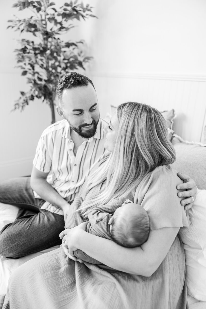 a family laughing during a photography session