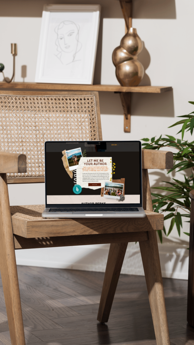 A poster depicting an elopement photographer website homepage resting on a deep sienna colored leather couch