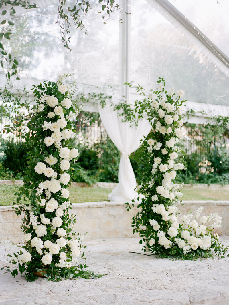 Outdoor wedding ceremony beneath oak trees at The Allan House