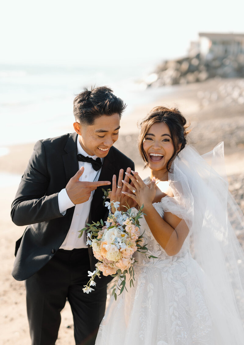 groom kissing brides forehead