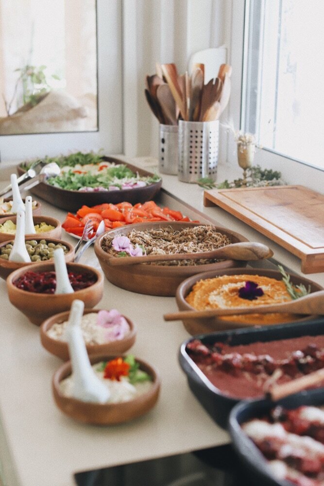 Colourful vegan food in buffet form for a yoga retreat