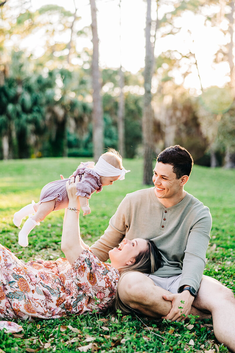 Laughter-filled holiday mini session near the waterfront in Old Northeast St. Pete.