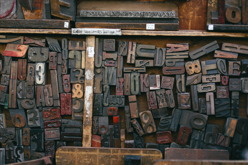 Jumbled container of sort typesetting of all shapes, sizes, and fonts.