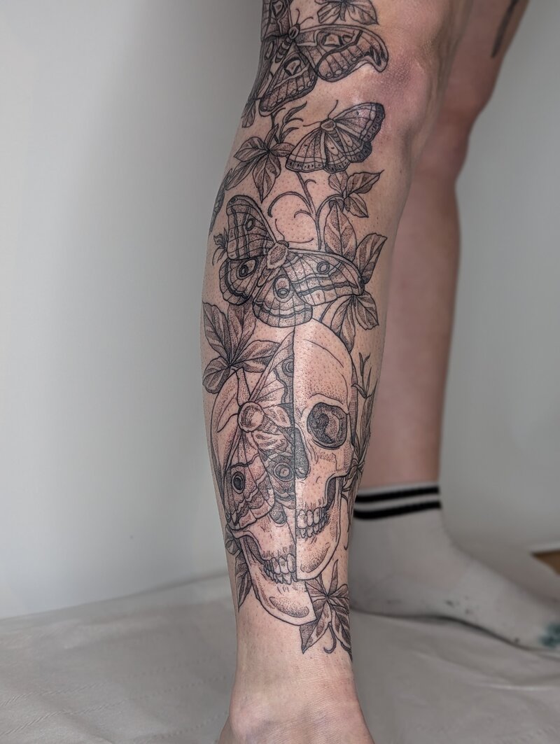 black-and-grey-fine-line-tattoo