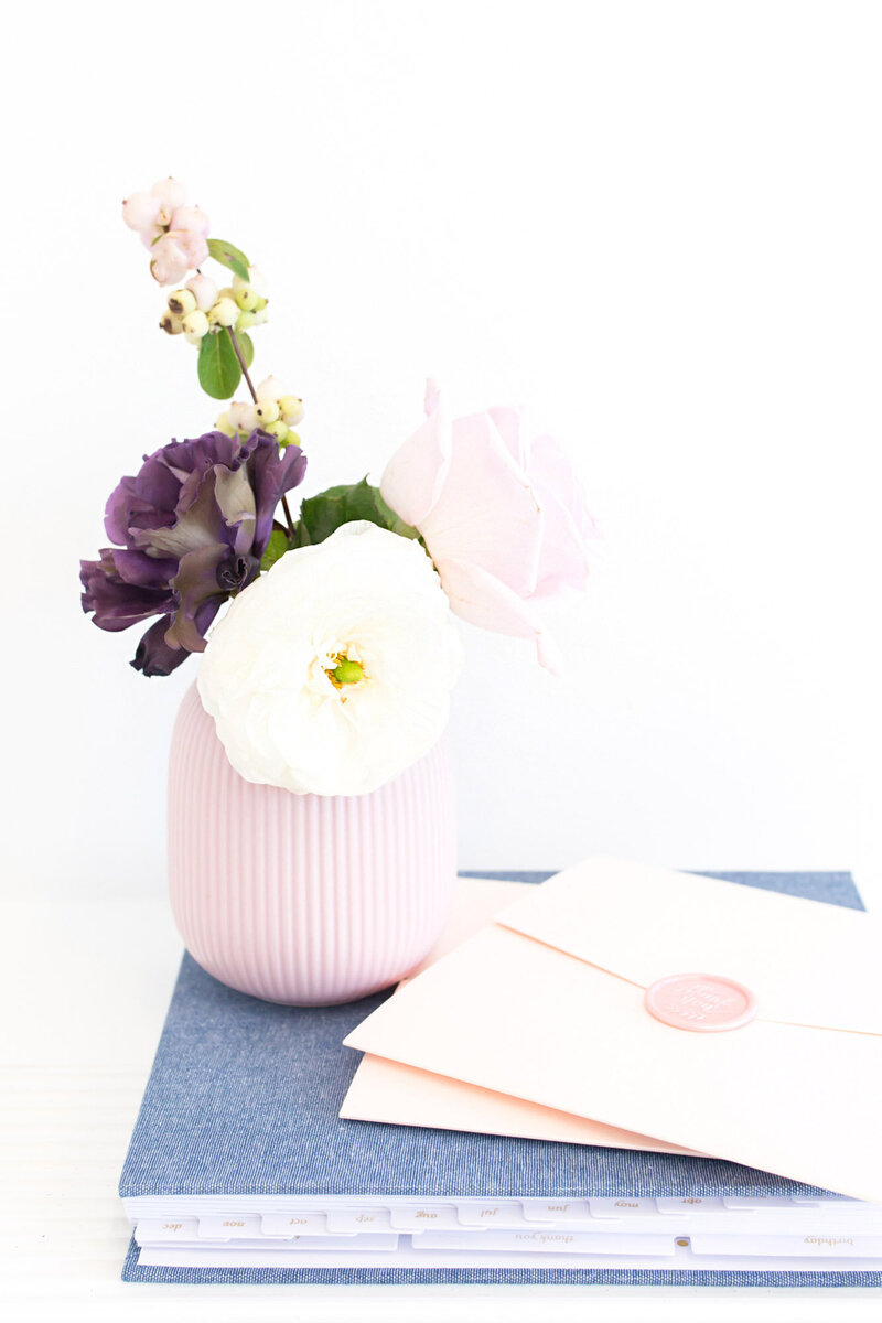 Bouquet of flowers on top of a journal