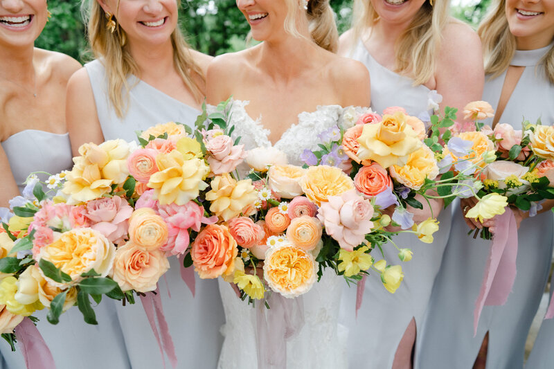 Colorful wedding bouquets at wedding planned by Bianca Nichole and Co