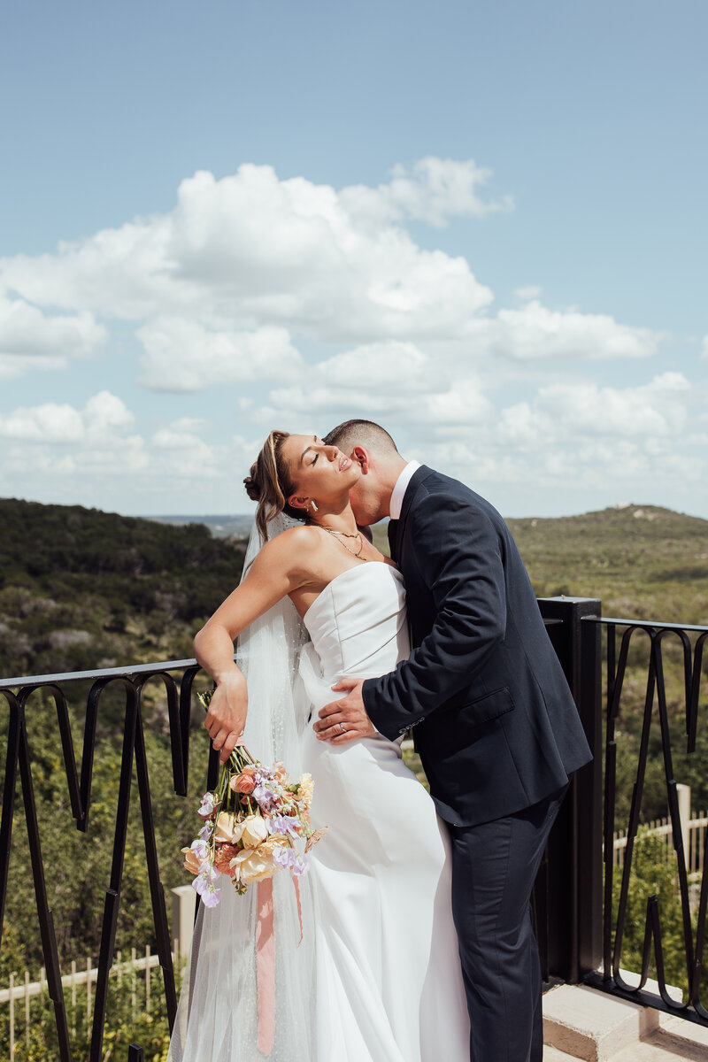 Gorgeous bride lays on grass
