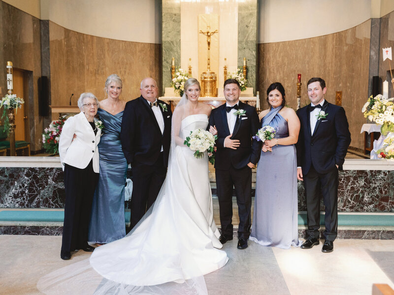 modern bride and groom with her parents siblings and Grandma