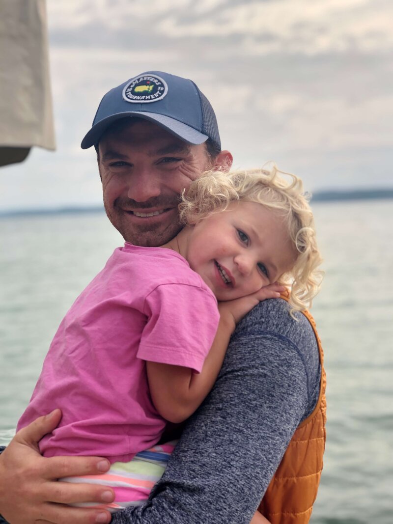 Jon and daughter posing for camera