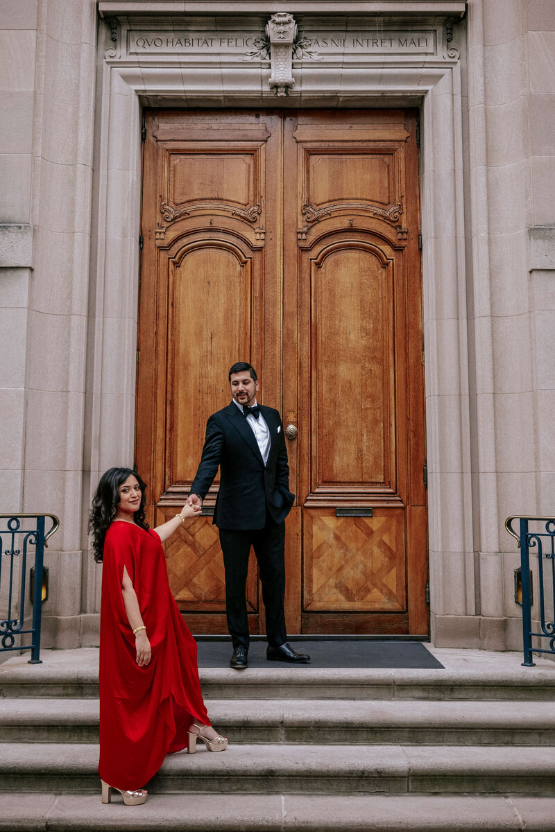 woman-in-red-dress-ascending-staircase