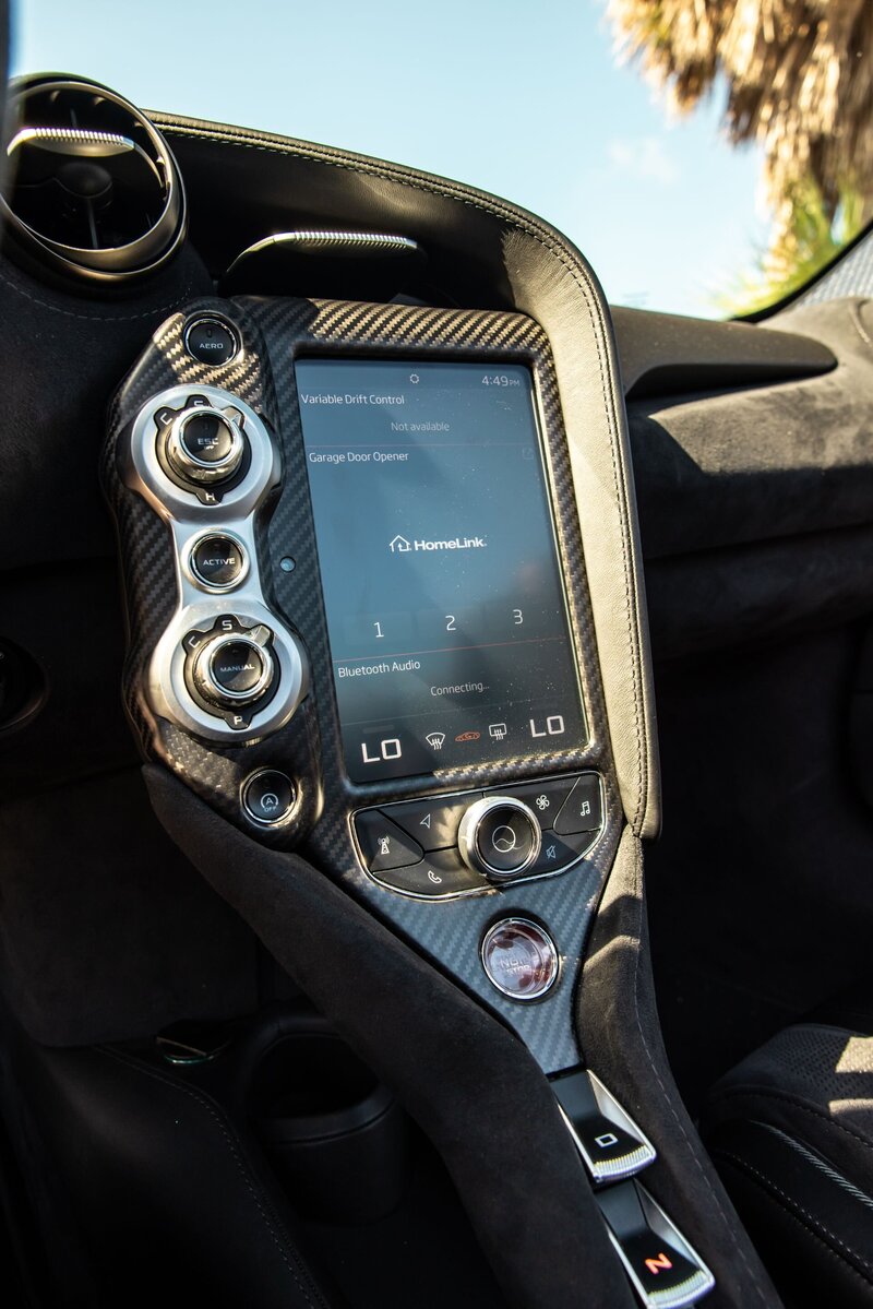 mclaren-720s-spider-convertible-black-for-rent-in-miami-center-console-infotainment-radio-drive-features-032