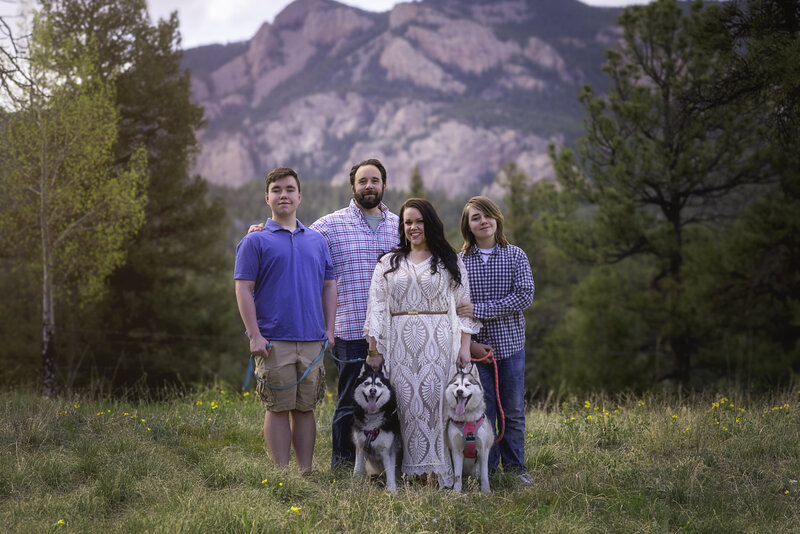Family portrait captured in Pine, Colorado by Sarah Farmer, creating beautiful memories in stunning natural settings.