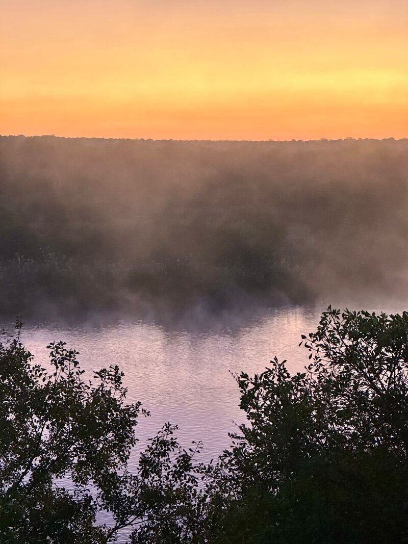 Mist over the Okavango river in the mornings