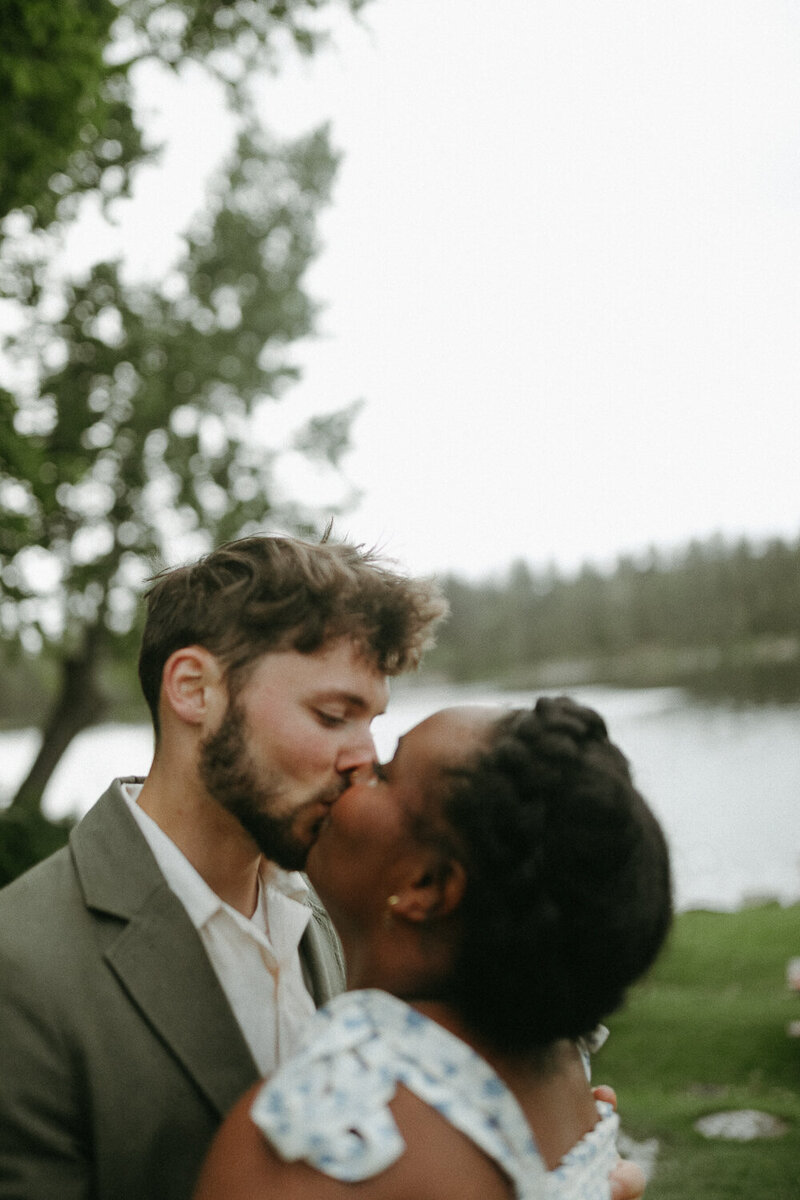 “Newlyweds dancing under string lights at sunset.”
