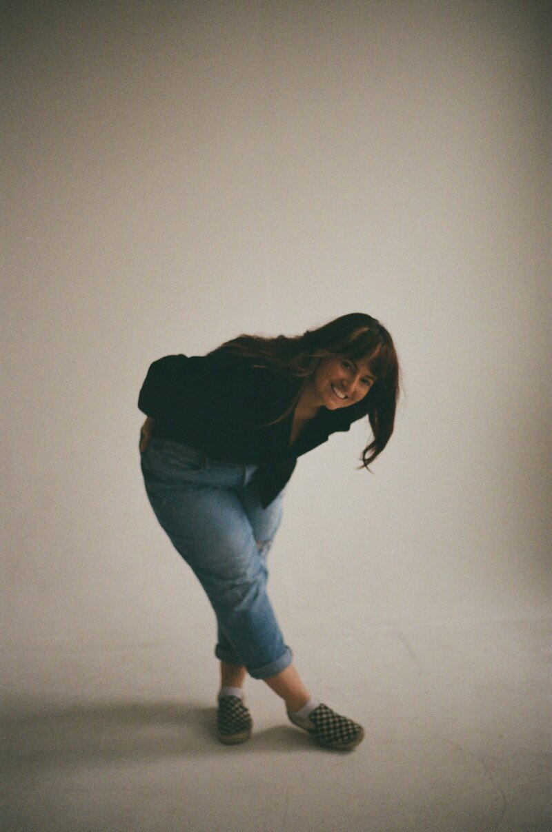Steph with camera and hair flip