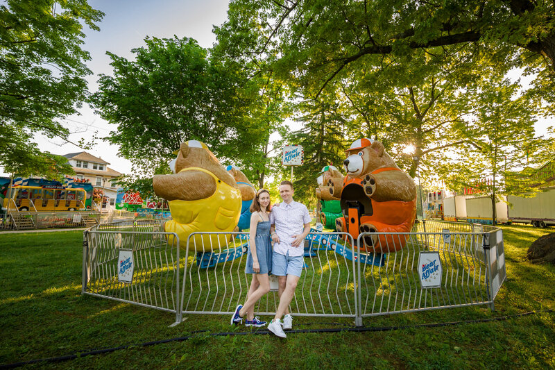 A whimsical engagement session at the Dogwood Festival in Phoenixville, capturing the couple’s joy with carnival rides, colorful lights, and playful vibes.