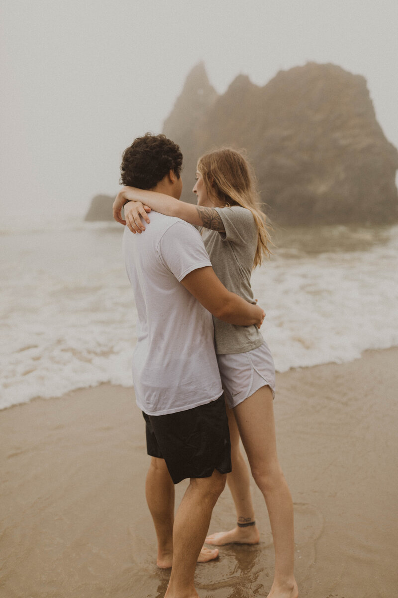 couple embracing on beach