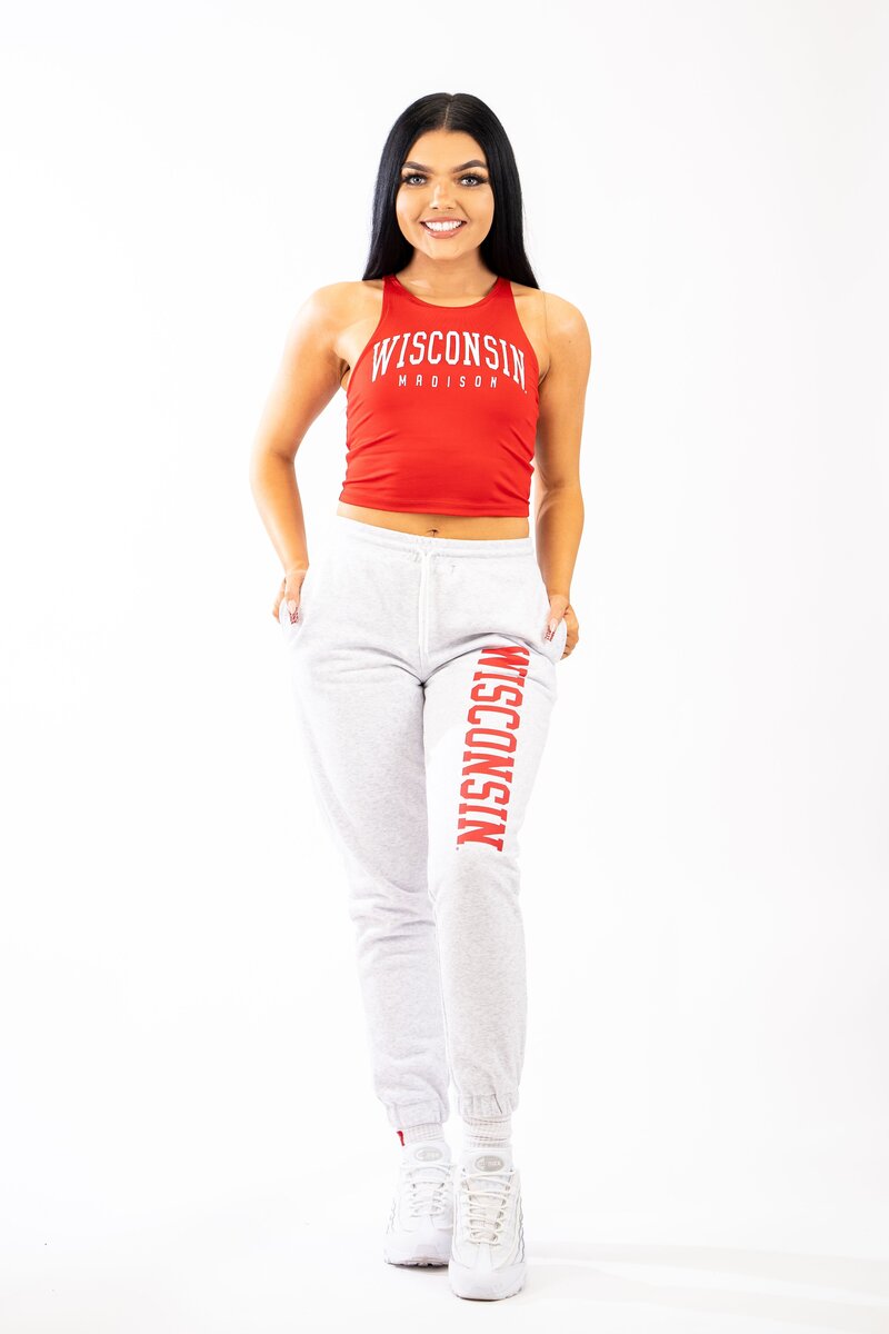white relaxed fit joggers with red wisconsin down the leg