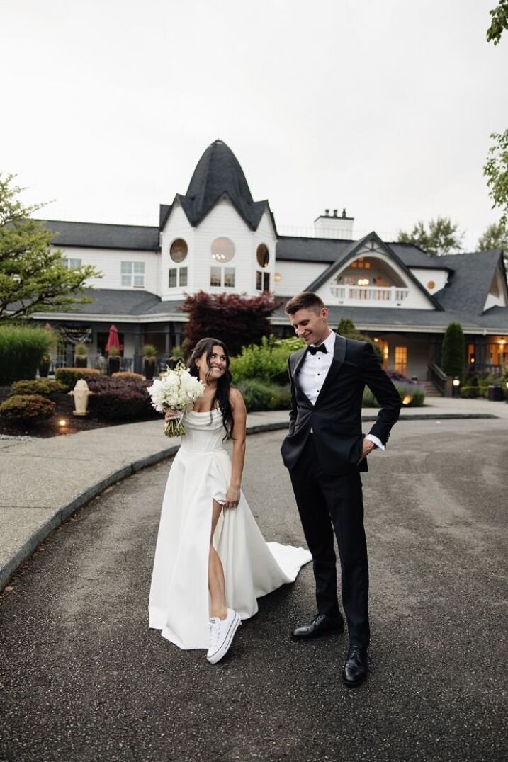 Bride and groom cutting cake at Colorado wedding