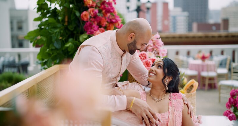 Indian wedding couple smiling at each other
