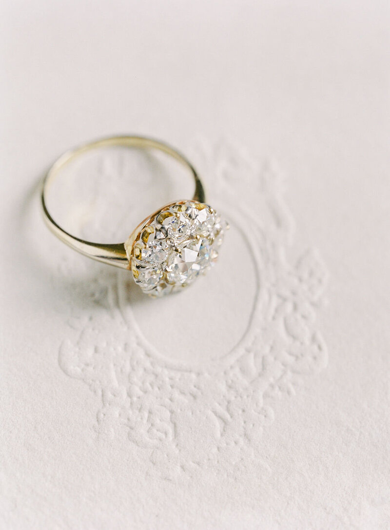 Vintage engagement ring detail flower halo