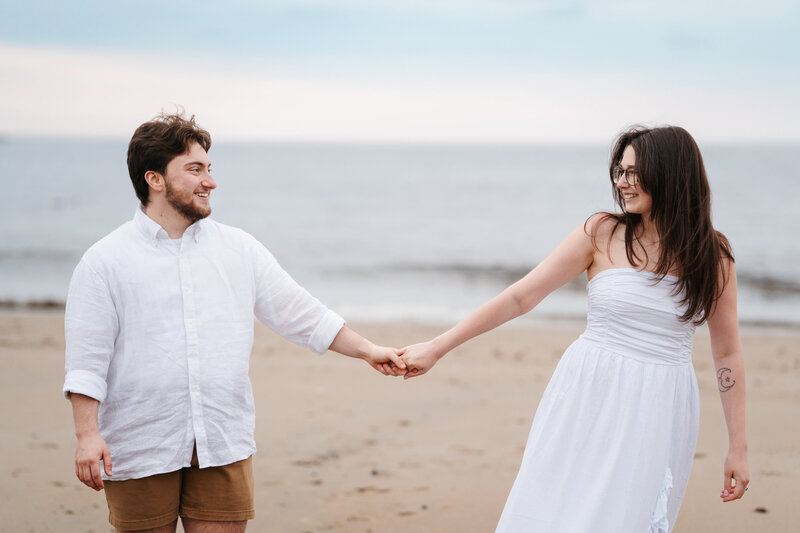 Couple having their engagement photos done in the summer 