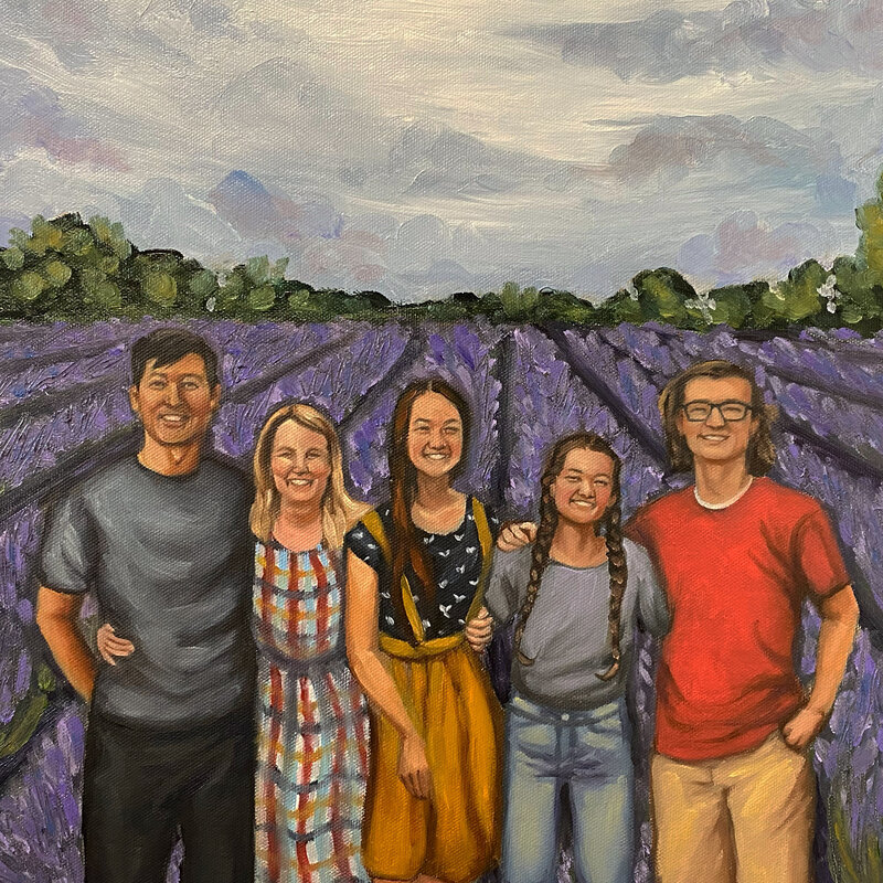 A portrait of a family in a lavender field. 