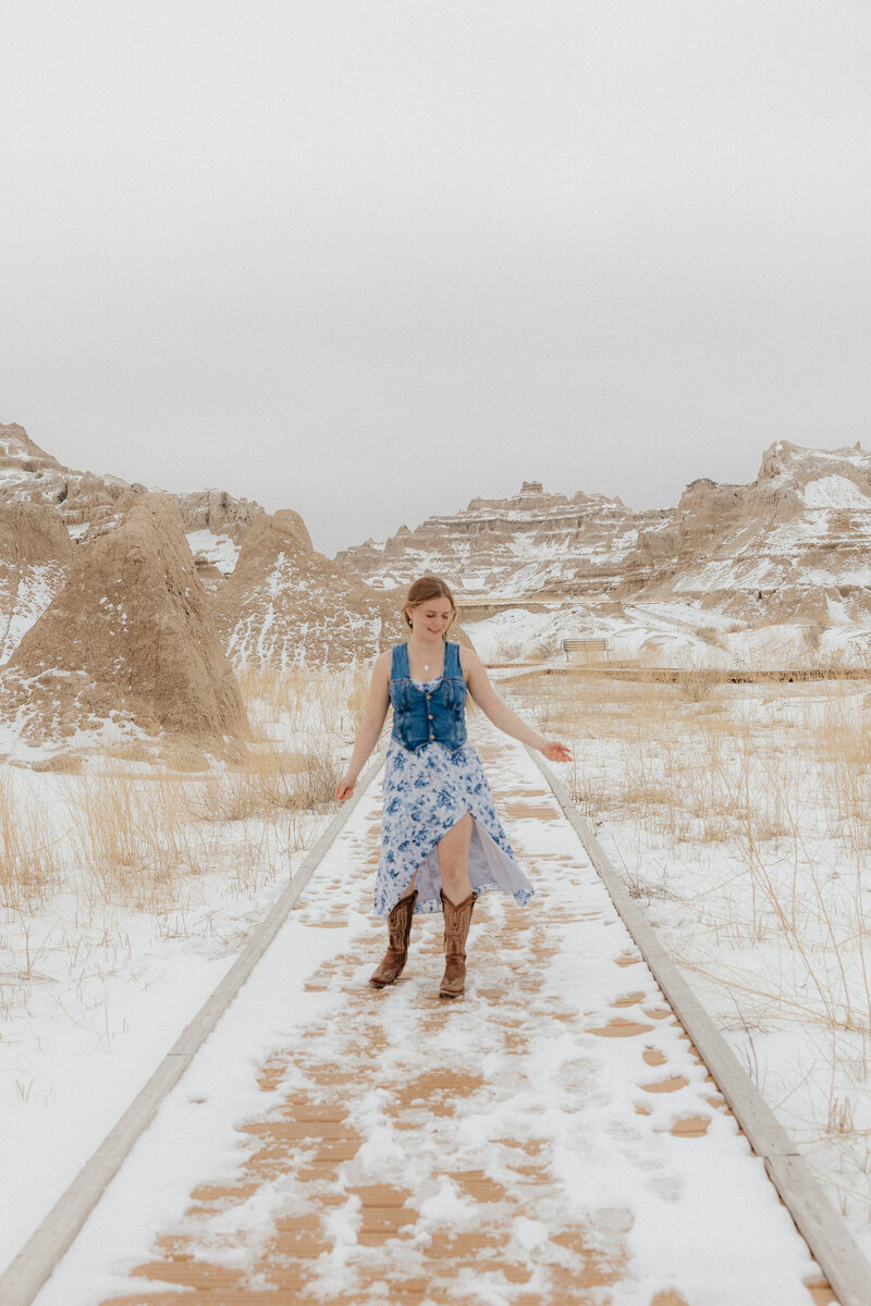 Girl spinning in a dress.