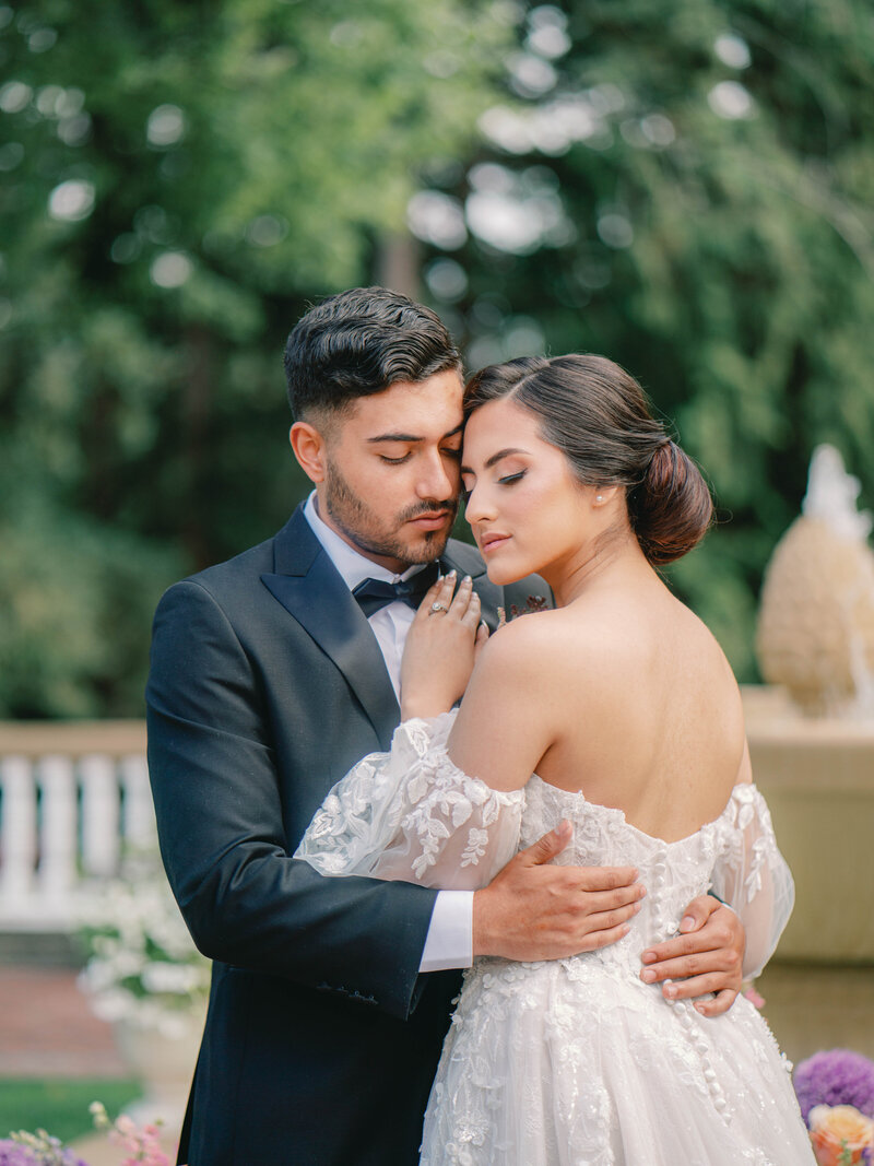 Bride and groom walk up memorial steps at their DC wedding