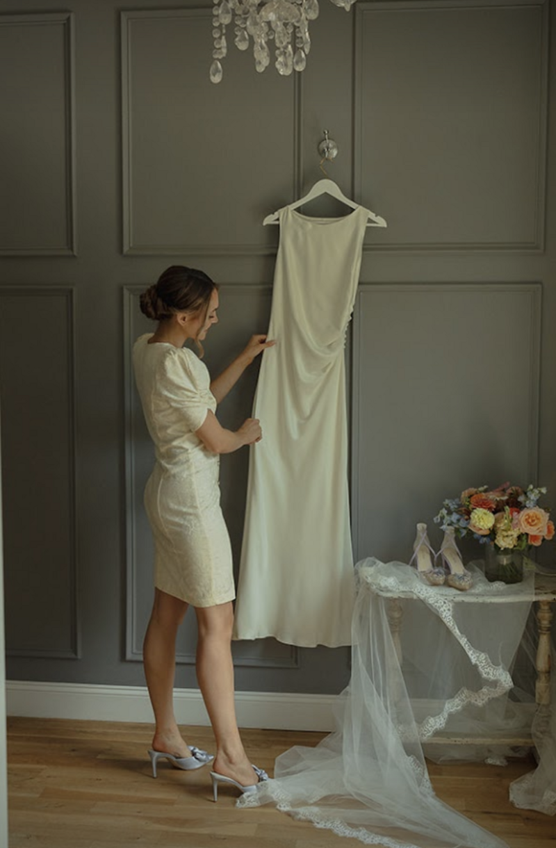 bride with her wedding gown at the bradford in new hill nc vintage silk