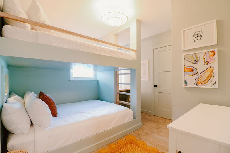 queen bunk beds with white linens