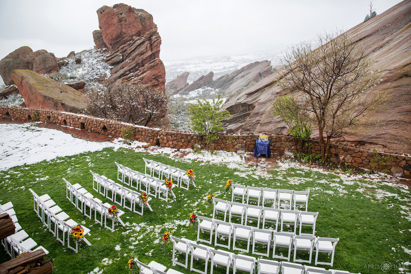 Spring wedding with snow at the Red Rocks Trading Post Backyard in Morrison Colorado