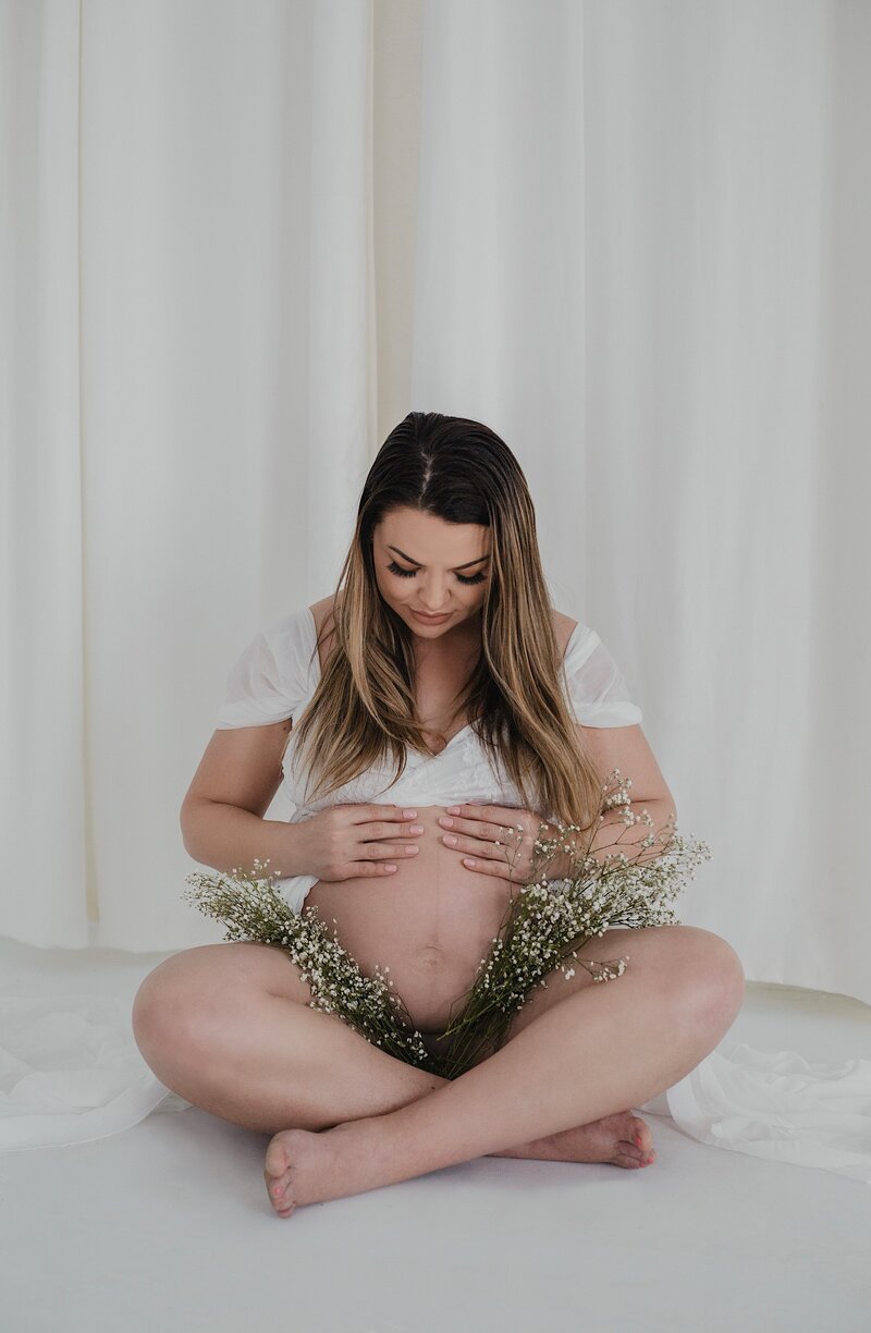 Pregnant woman studio portrait in albuquerque.