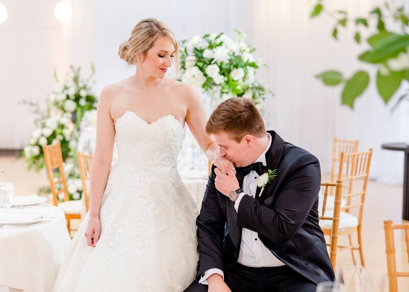 Wedding reception arrangements made of white garden roses and Italian ruscus greenery. Elegant wedding flowers by Kim Pawley Helfgott of The Garden Studio LLC. 