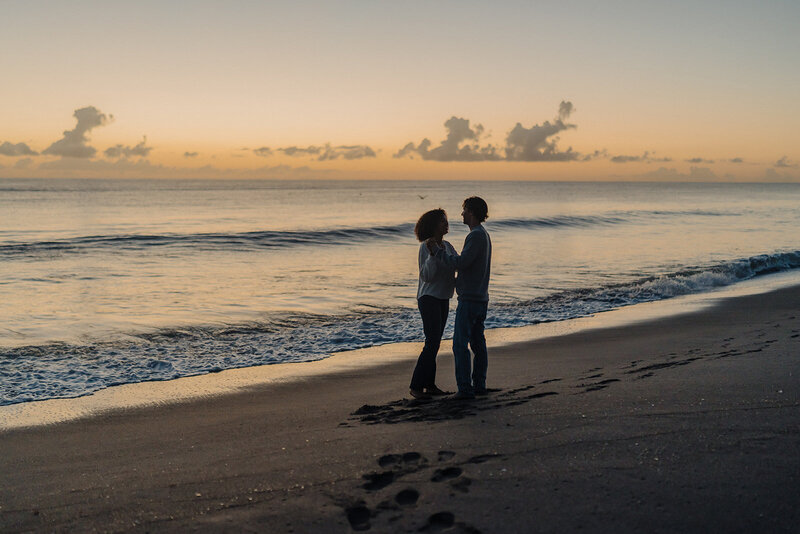 engaged couple on south florida beach