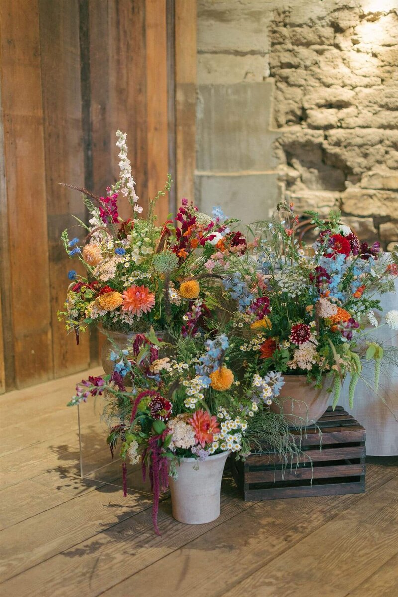 Wildflower arrangements at a Monterey, CA wedding