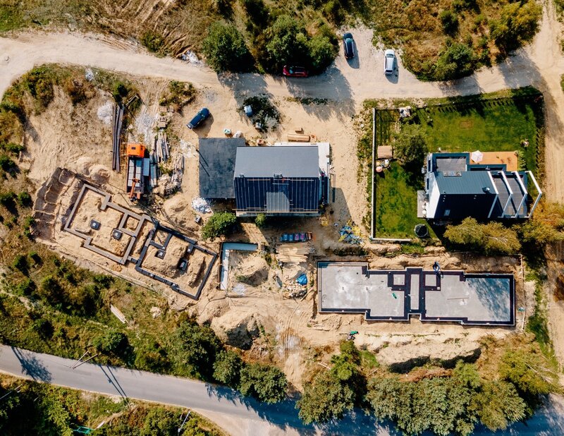 aerial survey of houses and towns shot from helicopter view