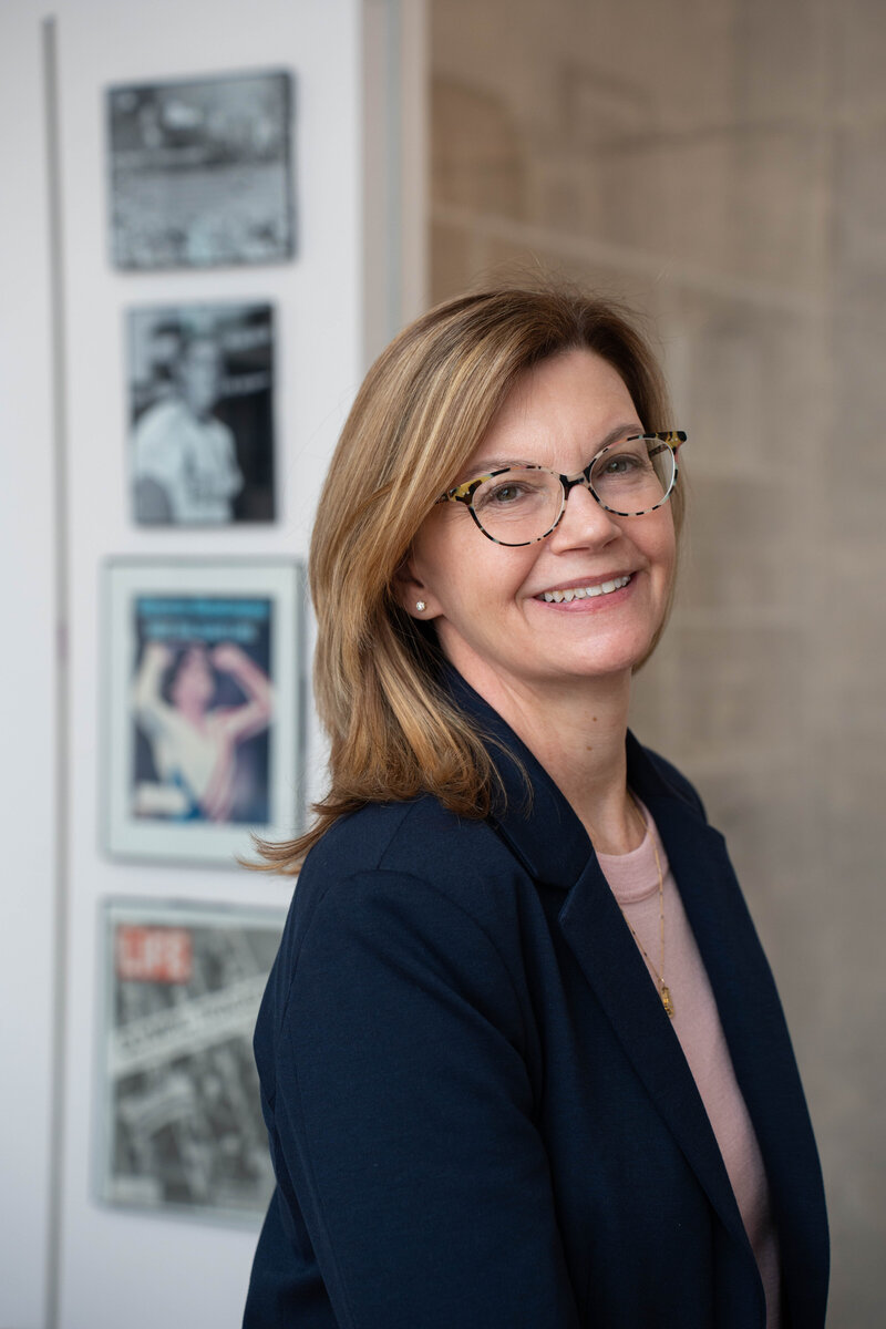 Professor Dionne Koller, a distinguished law professor with expertise in sports law, smiling confidently in a professional headshot.