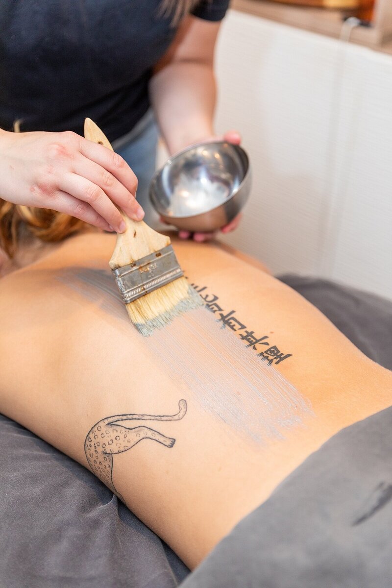 Back facial treatment at Rachel's Spa Services in Canfield, Ohio. A client relaxes as a skilled esthetician applies soothing products to cleanse, exfoliate, and hydrate the back for smooth, refreshed skin.