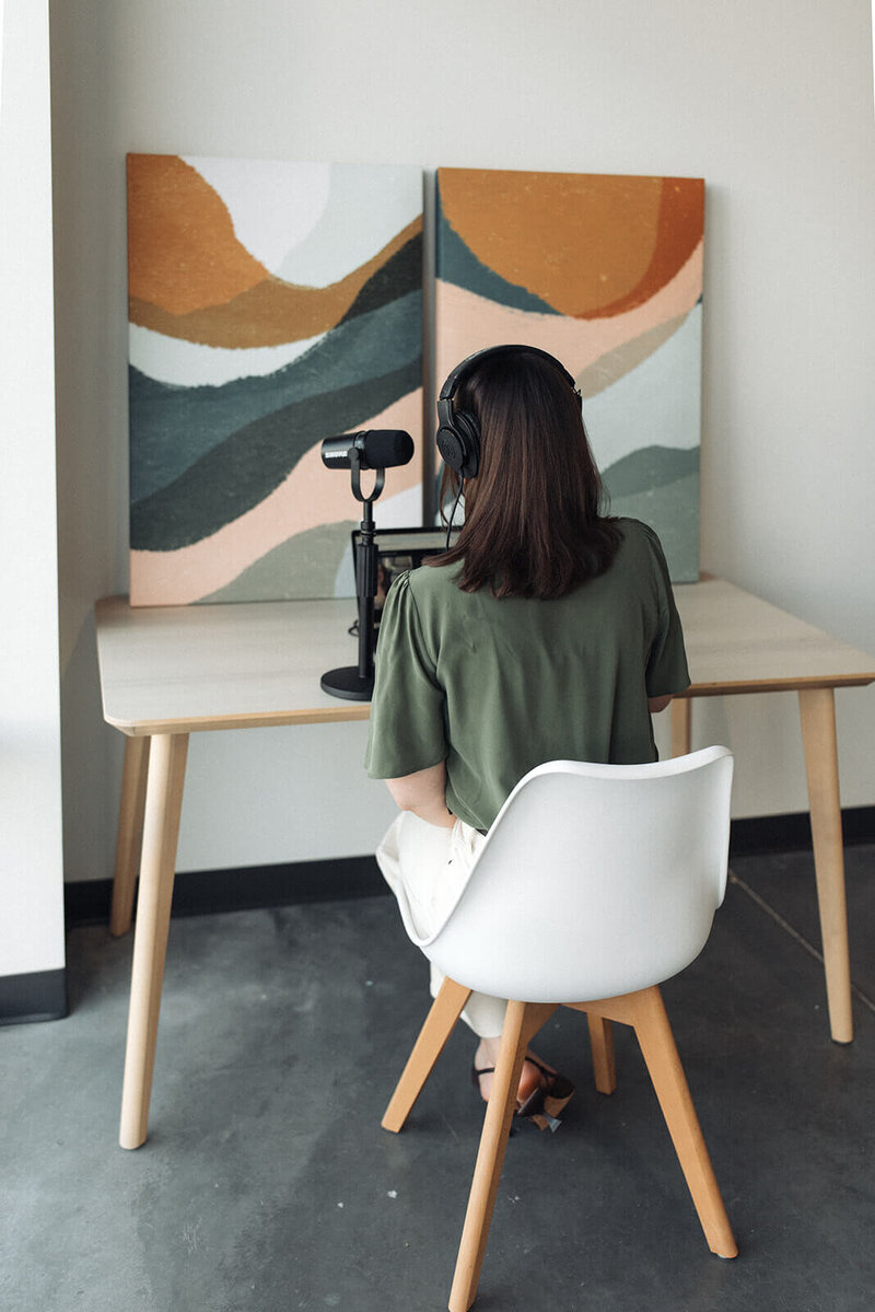 Chloe on a podcast interview after pitching herself to the press