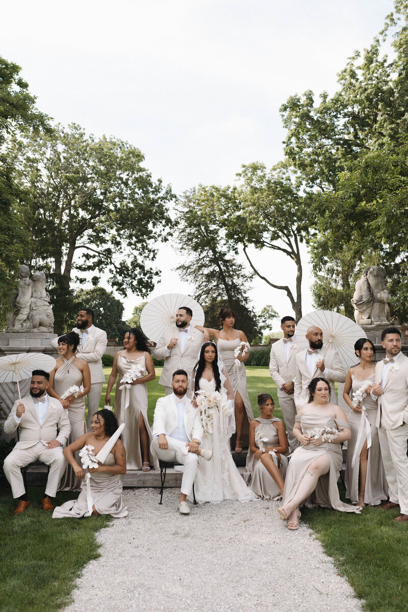 bridal party with parasols portrait