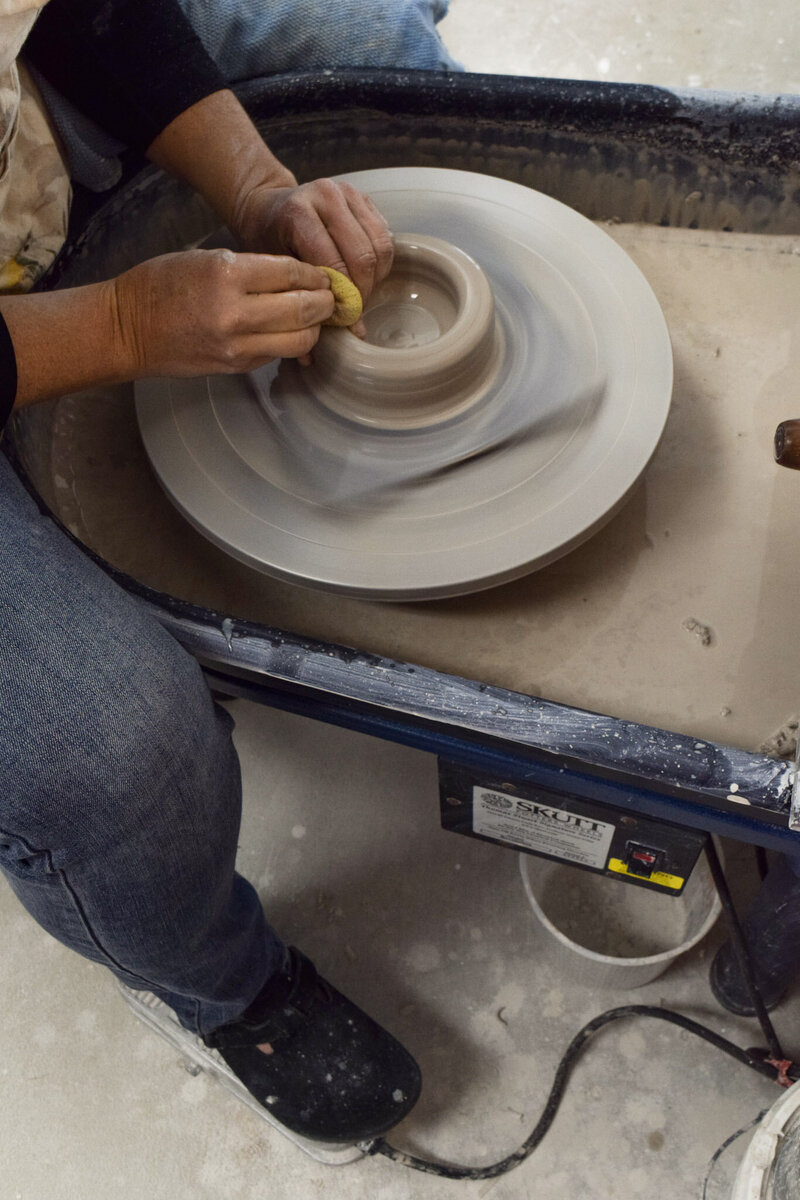 Jill throws a vase on her "Skutt" pottery wheel
